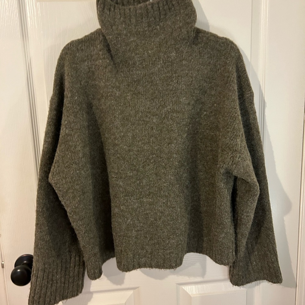 The Lennon Wide-Sleeve
Turtleneck Sweater by Pilcro